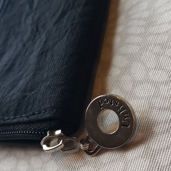 Unlisted Black Wallet by Kenneth Cole - 2/$15 - Picture 4 of 8